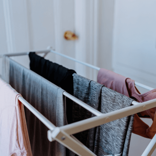 drying rack with clothes on it