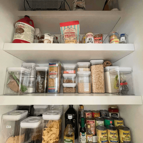 organized pantry items on shelves by Organized Jill