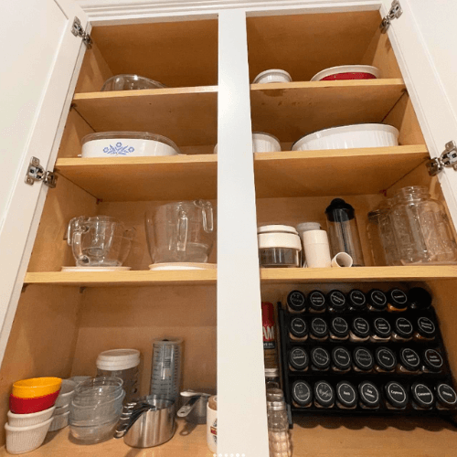 organized dishes in kitchen cabinet by Organized Jill