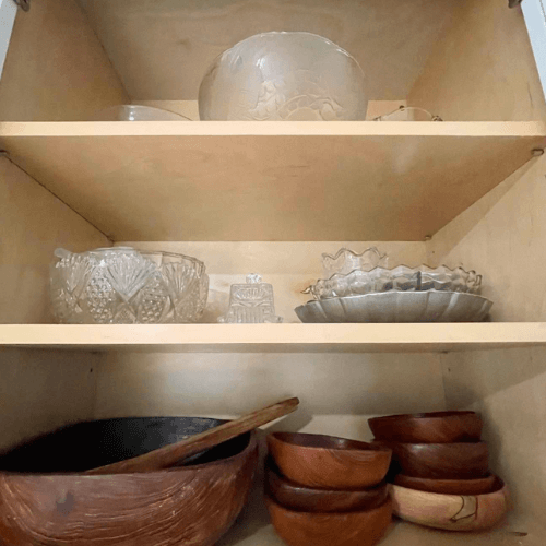 organized serving dishes on shelf by Organized Jill
